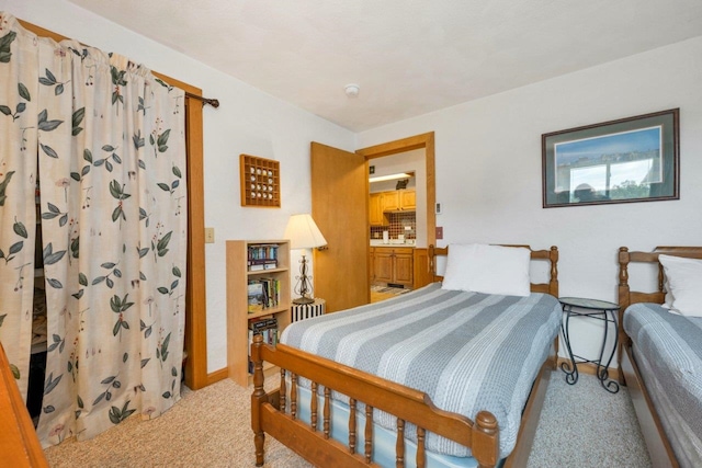 F22 Christmas Mountain Rd Unit 22, Bartlett, NH 03812 - bedroom featuring light carpet and baseboards