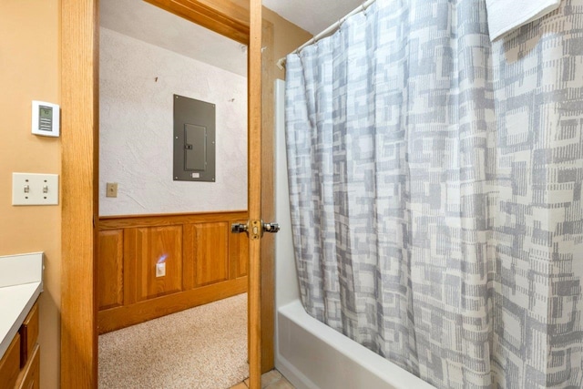 F22 Christmas Mountain Rd Unit 22, Bartlett, NH 03812 - full bathroom with electric panel, vanity, shower / tub combo, and a wainscoted wall