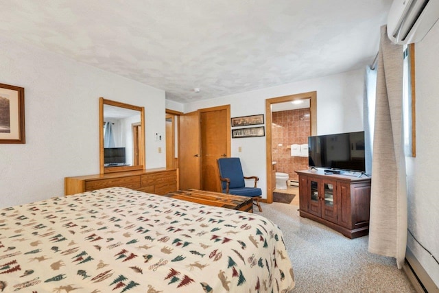 F22 Christmas Mountain Rd Unit 22, Bartlett, NH 03812 - carpeted bedroom featuring an AC wall unit, connected bathroom, and a baseboard heating unit