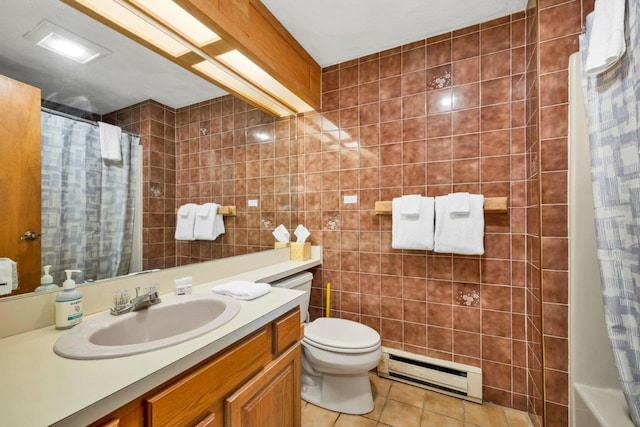 F22 Christmas Mountain Rd Unit 22, Bartlett, NH 03812 - full bath with baseboard heating, tile patterned floors, vanity, and tile walls