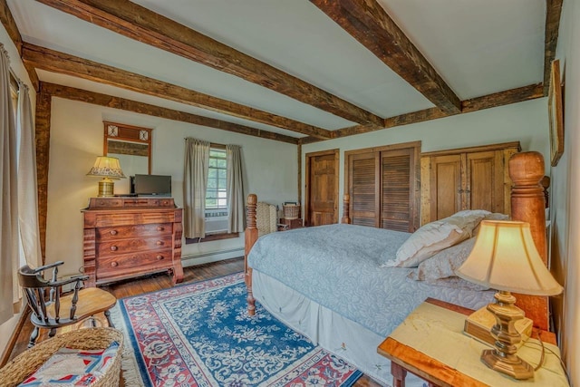3247 Rte 302, Lisbon, NH 03585 - bedroom featuring a baseboard radiator, beamed ceiling, and wood finished floors
