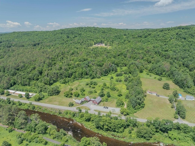 3247 Rte 302, Lisbon, NH 03585 - aerial view of property and surrounding area featuring a heavily wooded area