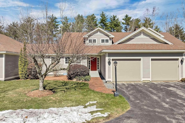 107 Peaked Hill Rd, Hopkinton, NH 03229 - view of front of home with a garage, asphalt driveway, a front lawn, and roof with shingles