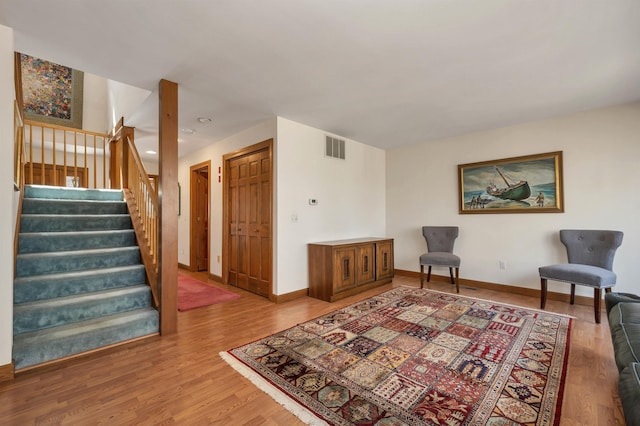 107 Peaked Hill Rd, Hopkinton, NH 03229 - living area with stairway and wood finished floors