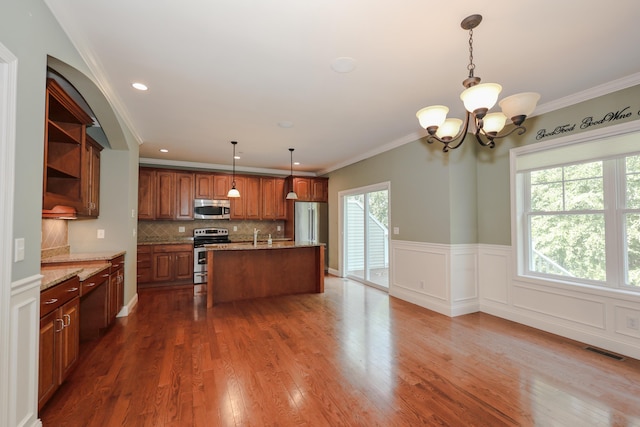 2C Manor Dr, Hooksett, NH 03106 - kitchen featuring appliances with stainless steel finishes, brown cabinets, a chandelier, dark wood-type flooring, and recessed lighting