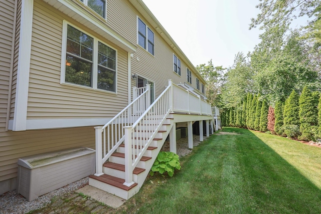 2C Manor Dr, Hooksett, NH 03106 - back of property featuring a yard, stairs, and a deck