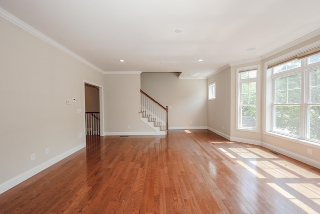 2C Manor Dr, Hooksett, NH 03106 - empty room with crown molding, light wood-type flooring, stairs, and recessed lighting