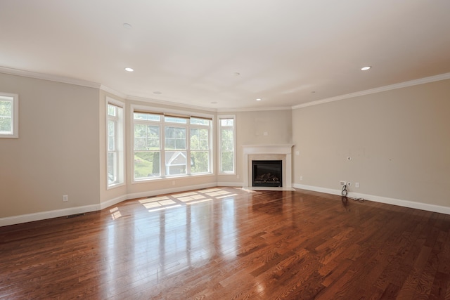 2C Manor Dr, Hooksett, NH 03106 - unfurnished living room featuring ornamental molding, wood finished floors, a fireplace with flush hearth, and recessed lighting
