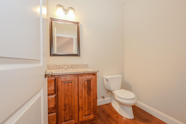 2C Manor Dr, Hooksett, NH 03106 - bathroom with wood finished floors and vanity