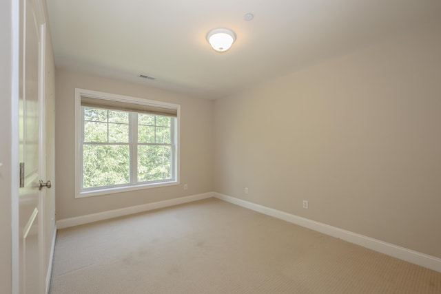 2C Manor Dr, Hooksett, NH 03106 - unfurnished room featuring light carpet and baseboards