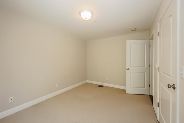 2C Manor Dr, Hooksett, NH 03106 - unfurnished bedroom with light colored carpet and baseboards