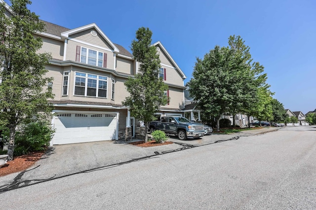2C Manor Dr, Hooksett, NH 03106 - multi unit property with an attached garage and driveway