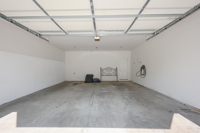 2C Manor Dr, Hooksett, NH 03106 - garage featuring a garage door opener
