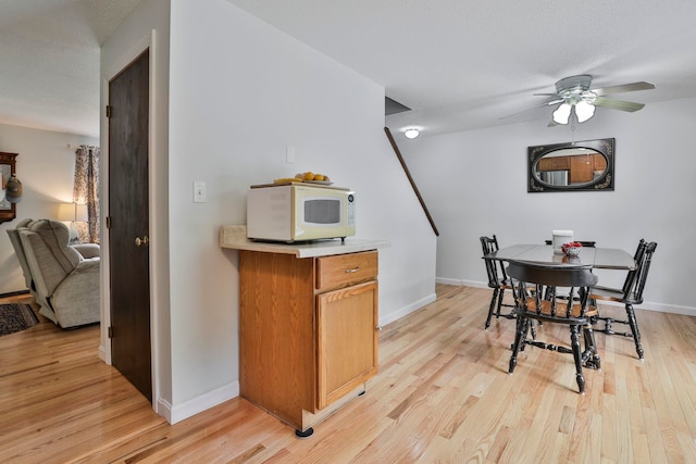 22 Pelham Rd, Hudson, NH 03051 - dining room featuring light wood finished floors and ceiling fan
