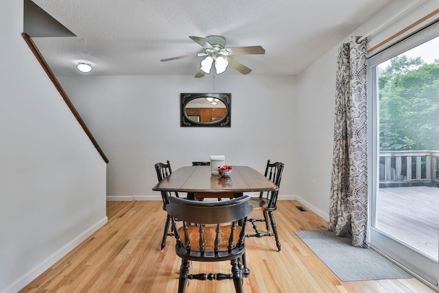 22 Pelham Rd, Hudson, NH 03051 - dining area featuring light wood finished floors, a ceiling fan, and a textured ceiling