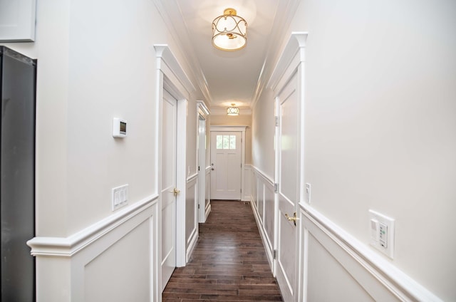 50 Newfields Rd Unit A, Exeter, NH 03833 - hallway featuring ornamental molding, dark wood-style floors, a decorative wall, and a wainscoted wall