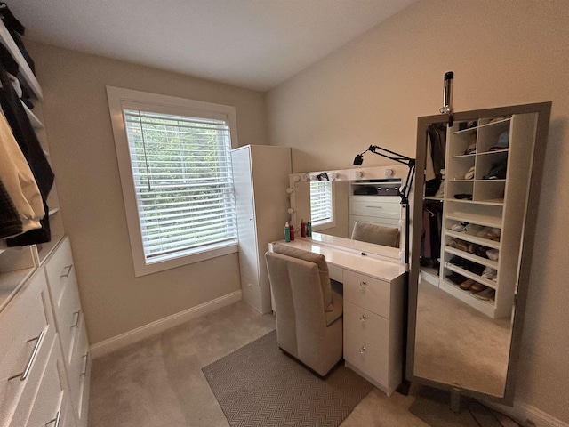 50 Newfields Rd Unit A, Exeter, NH 03833 - laundry room with light colored carpet and an office area