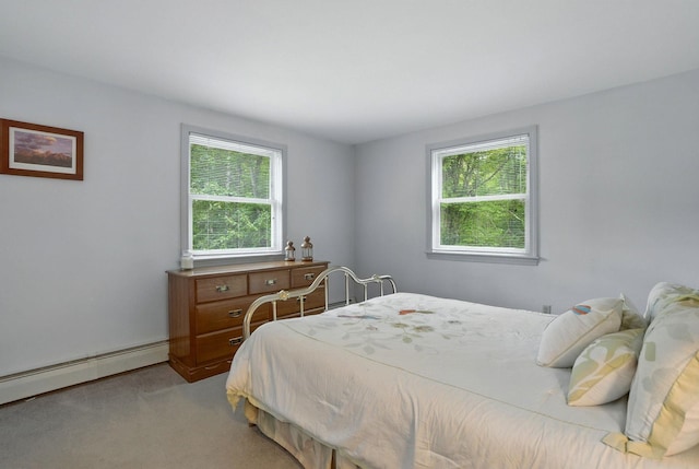 38 Cambridge Rd, Bedford, NH 03110 - bedroom with baseboard heating, multiple windows, and carpet