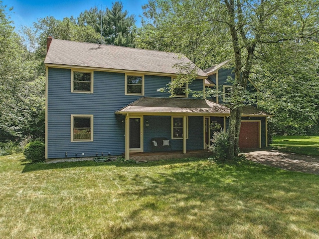 38 Cambridge Rd, Bedford, NH 03110 - view of front facade with covered porch, a chimney, a front lawn, and an attached garage