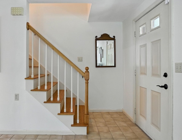 38 Cambridge Rd, Bedford, NH 03110 - entrance foyer with stairs and baseboards