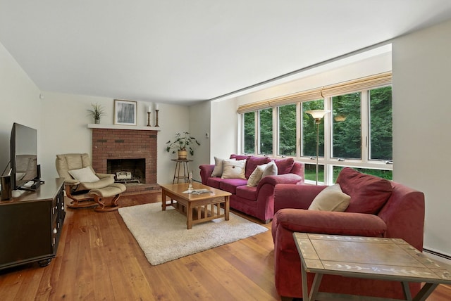 38 Cambridge Rd, Bedford, NH 03110 - living room with wood-type flooring and a fireplace