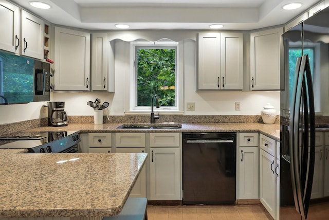 38 Cambridge Rd, Bedford, NH 03110 - kitchen with black appliances, recessed lighting, open shelves, and light stone countertops