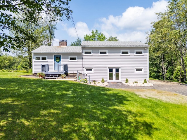 626 County Rd, New London, NH 03257 - back of house with french doors, a chimney, a yard, and roof with shingles