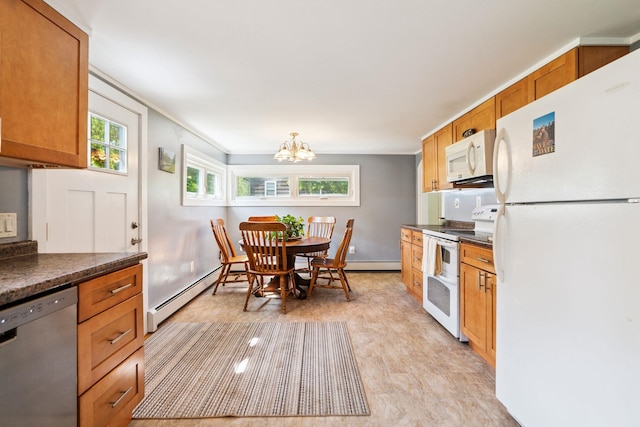 626 County Rd, New London, NH 03257 - kitchen featuring white appliances, a baseboard heating unit, dark countertops, a chandelier, and brown cabinets