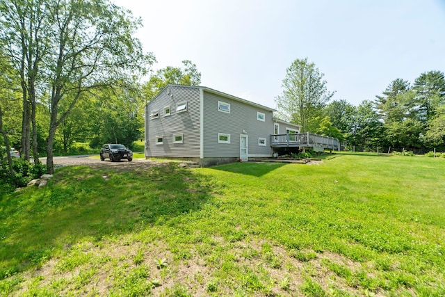 626 County Rd, New London, NH 03257 - view of home's exterior featuring a wooden deck, a yard, and dirt driveway