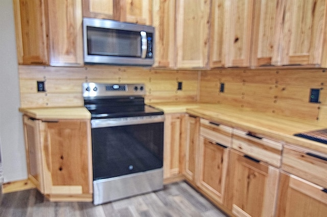 00 Serenity Ln, Lisbon, NH 03585 - kitchen with appliances with stainless steel finishes and light wood-type flooring
