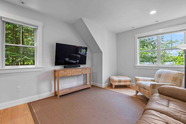 184 Bowles Rd, Newbury, NH 03855 - living room with plenty of natural light, wood finished floors, and recessed lighting