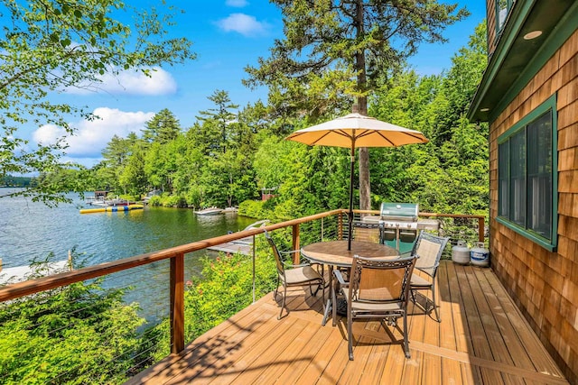 184 Bowles Rd, Newbury, NH 03855 - wooden terrace with a water view, grilling area, outdoor dining area, and view of scattered trees