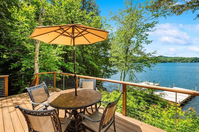 184 Bowles Rd, Newbury, NH 03855 - wooden terrace featuring a water view and outdoor dining space