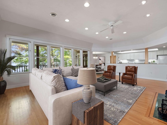 432 Shore Dr, Laconia, NH 03246 - living room with ceiling fan, recessed lighting, and light wood finished floors