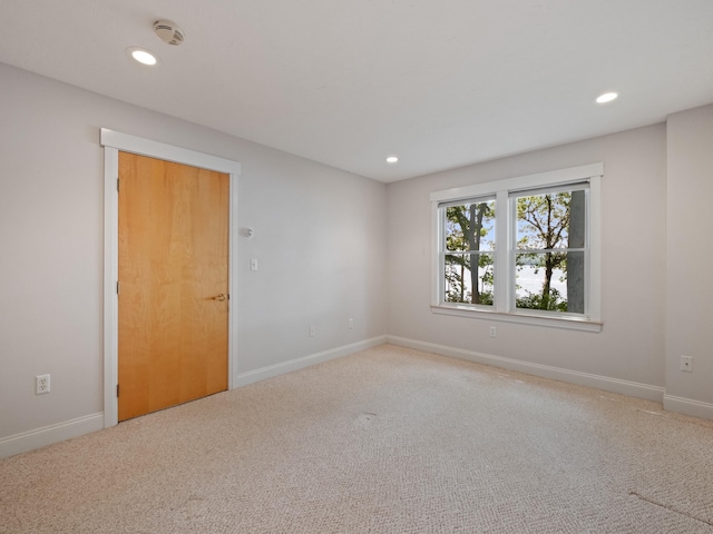 432 Shore Dr, Laconia, NH 03246 - carpeted empty room featuring recessed lighting and a smoke detector