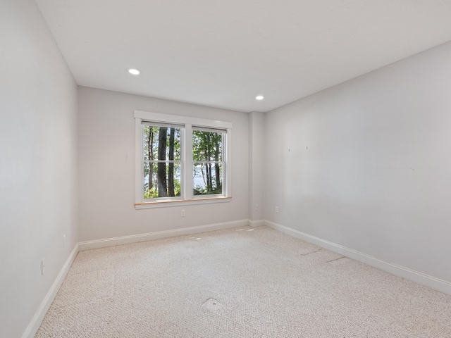 432 Shore Dr, Laconia, NH 03246 - spare room featuring carpet and recessed lighting