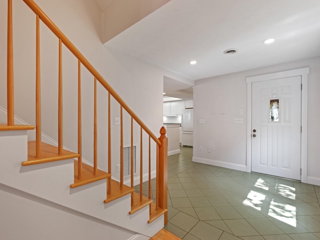 432 Shore Dr, Laconia, NH 03246 - tiled entryway featuring stairs and recessed lighting