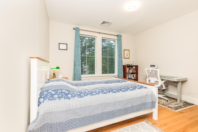 32 Willey Creek Rd Unit 402, Exeter, NH 03833 - bedroom featuring wood finished floors and baseboards