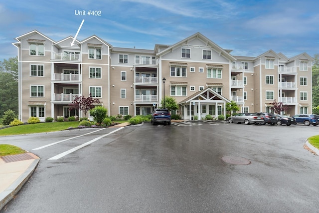 32 Willey Creek Rd Unit 402, Exeter, NH 03833 - view of apartment building / complex with uncovered parking