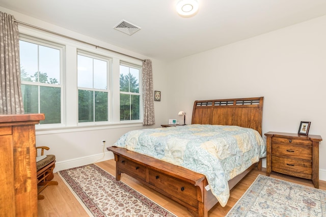 32 Willey Creek Rd Unit 402, Exeter, NH 03833 - bedroom with wood finished floors and baseboards