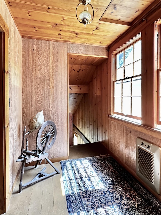 32 Pikes Point Rd, Bristol, NH 03222 - bonus room featuring wood ceiling, wooden walls, hardwood / wood-style flooring, and a wall mounted AC