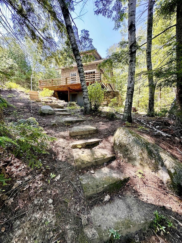 32 Pikes Point Rd, Bristol, NH 03222 - view of yard with a wooden deck