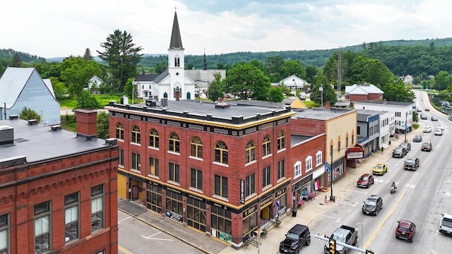 359 Central St Unit 3, Franklin, NH 03235 - view of building exterior featuring uncovered parking