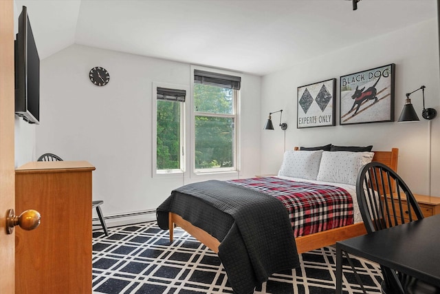 E12 Rock Ridge Rd, Winhall, VT 05340 - bedroom with a baseboard heating unit and lofted ceiling