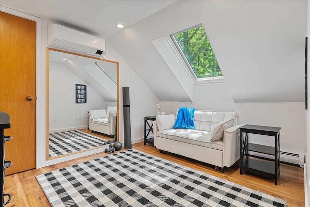 E12 Rock Ridge Rd, Winhall, VT 05340 - bedroom featuring a wall mounted air conditioner, light wood-type flooring, a skylight, vaulted ceiling, and baseboard heating