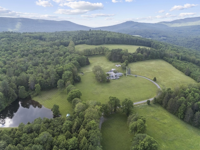 611 Simmons Rd, Andover, VT 05143 - overview of rural landscape with a water and mountain view and a heavily wooded area