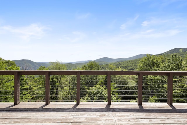 719 Roundabout Rd, Killington, VT 05751 - wooden deck with a mountain view