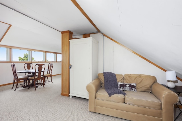 719 Roundabout Rd, Killington, VT 05751 - carpeted living area with lofted ceiling and baseboards