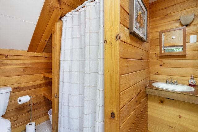 719 Roundabout Rd, Killington, VT 05751 - bathroom with wooden walls, vanity, and a shower with shower curtain