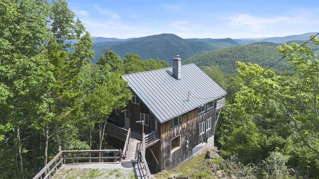 719 Roundabout Rd, Killington, VT 05751 - view of mountain backdrop featuring a forest